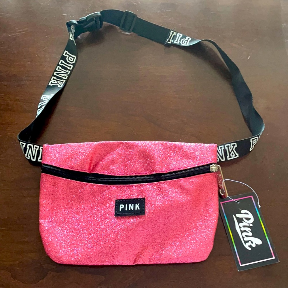 2 shirts headband 2 pink bows a pink Fanny pac